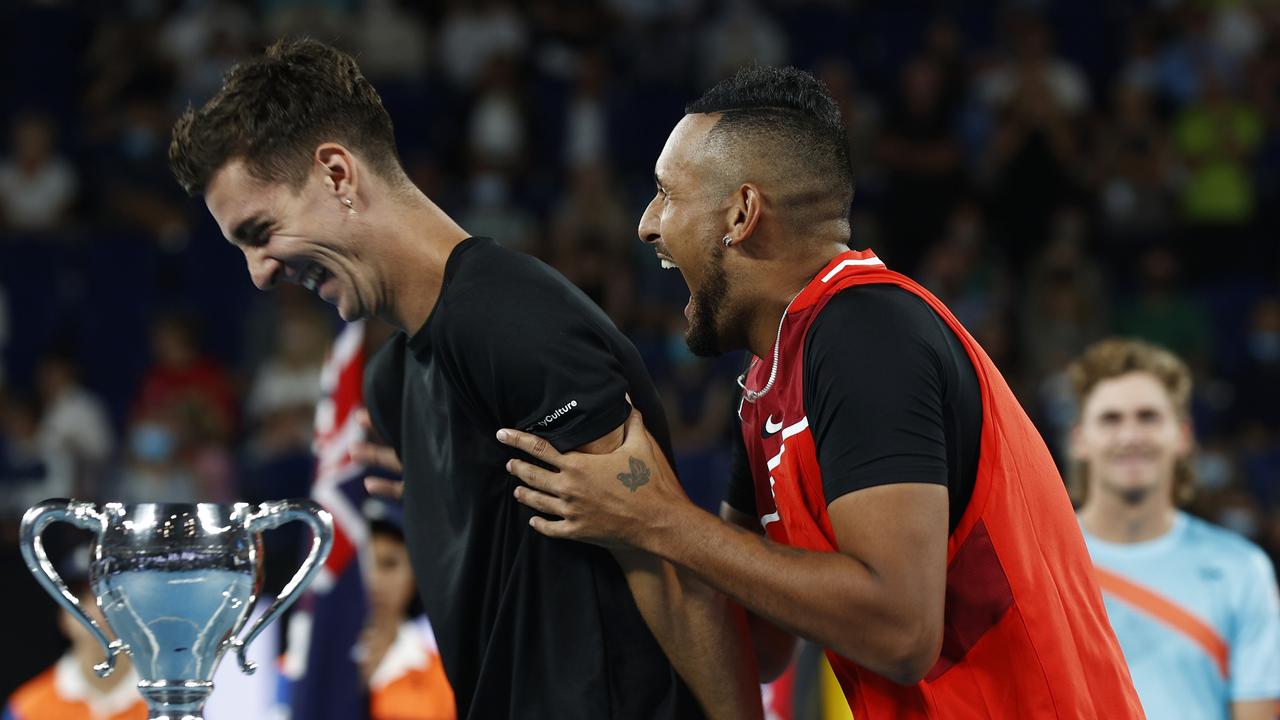 MELBOURNE, AUSTRALIA - JANUARY 29: Thanasi Kokkinakis (L) of Australia and Nick Kyrgios of Australia react after winning their Men's DoublesÃ&#130;Â Final match against Matthew Ebden of Australia and Max Purcell of Australia during day 13 of the 2022 Australian Open at Melbourne Park on January 29, 2022 in Melbourne, Australia. (Photo by Darrian Traynor/Getty Images)