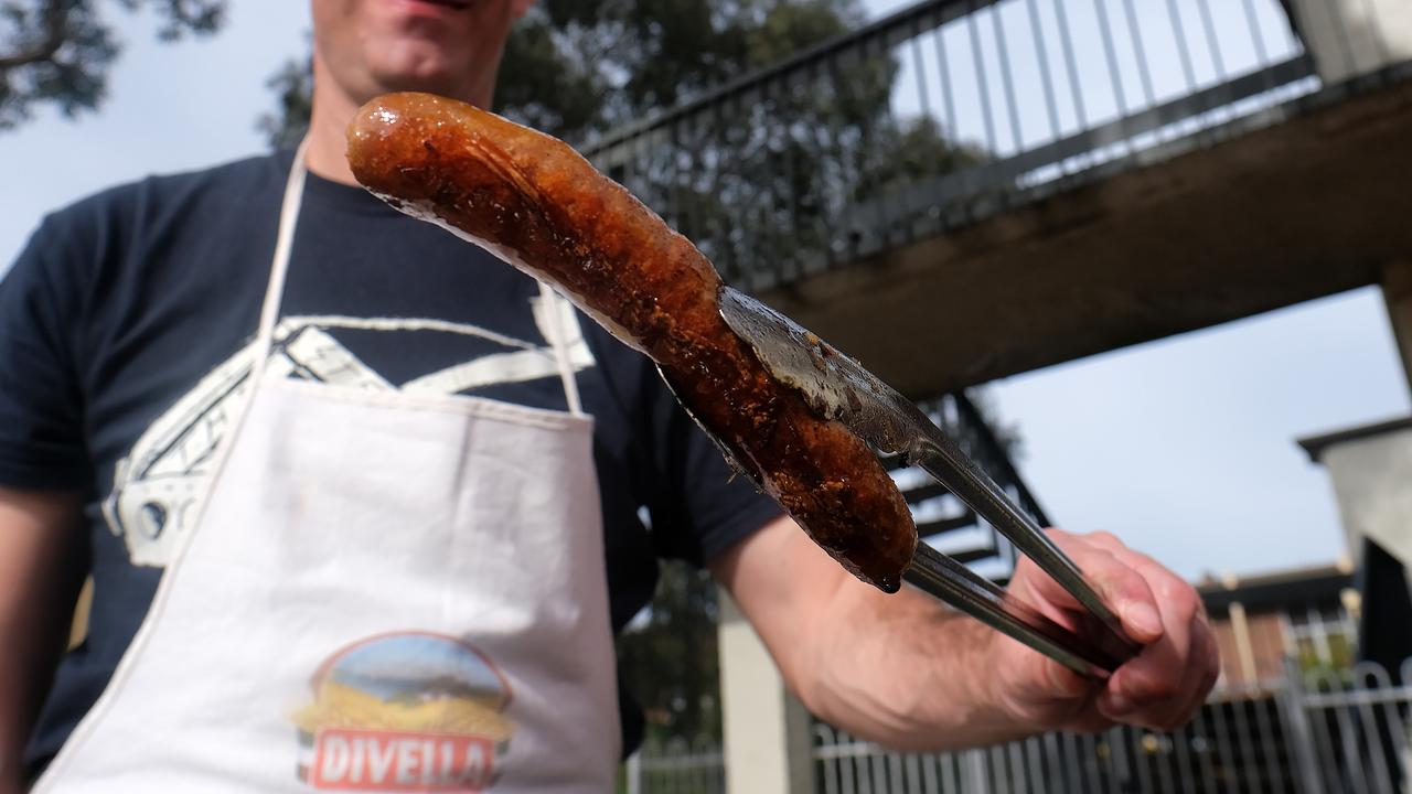 Charity groups, sport club, and school fundraising groups are concerned they won’t be able to get ‘qualified’ volunteers for sausage sizzles. Picture: NCA NewsWire / Luis Enrique Ascui