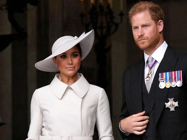 (FILES) In this file photo taken on June 03, 2022 Britain's Prince Harry, Duke of Sussex, and Britain's Meghan, Duchess of Sussex, leave at the end of the National Service of Thanksgiving for The Queen's reign at Saint Paul's Cathedral in London, as part of Queen Elizabeth II's platinum jubilee celebrations. - A probe into allegations of bullying by Meghan Markle against royal family staff has led to a change in HR policy but details will not be published, according to a senior family source. During a briefing on the annual royal finances report, published on June 30, 2022, a royal family spokesperson said that the details would remain hidden to protect the privacy of those who took part. (Photo by Matt Dunham / POOL / AFP)