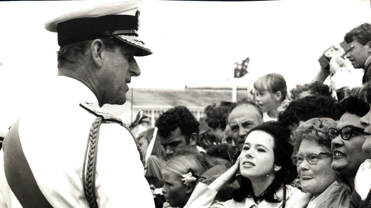 Prince Philip, the Duke of Edinburgh, talking to people in the crowd during his tour of Australia in 1970. Picture: News Ltd.