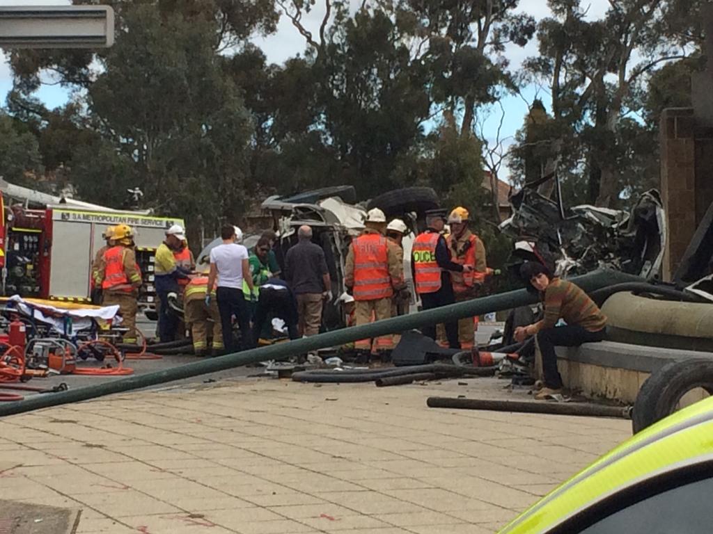 Emergency service workers at the scene of a serious smash at the bottom of the freeway. Picture: Sam Kelton