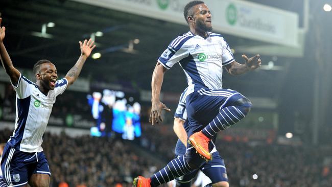 stephane Sessegnon (R) celebrates scoring the opening goal.