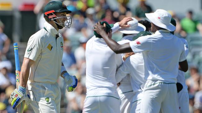 Peter Nevill walks off the WACA as South Africa celebrate. Picture: Daniel Wilkins