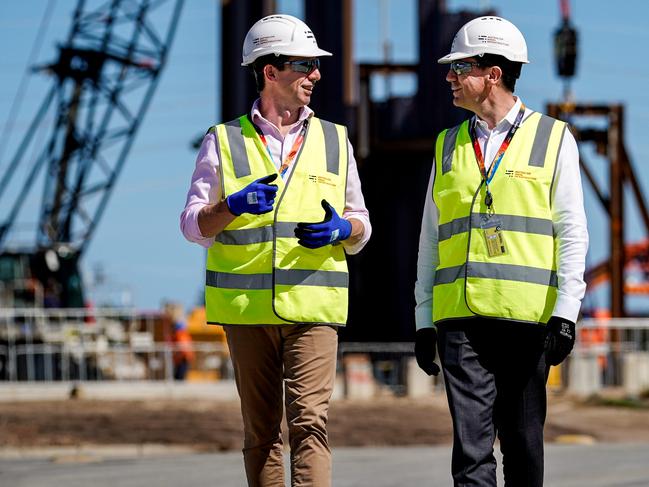 Finance Minister Simon Birmingham speaking with Naval Group global chief executive Pierre Eric Pommellet on Saturday at the new Osborne shipyard, where the Future Subs will be built. Picture: Mike Burton