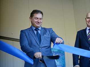 Member for wide Bay, Llew O'Brien cuts the ribbon to open the Nolan Meats state of the art processing plant. Picture: Tom Daunt