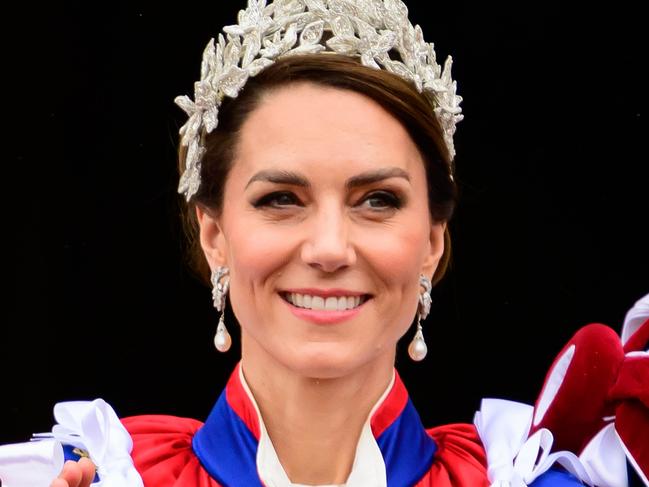 LONDON, ENGLAND - MAY 06: Catherine, Princess of Wales stands on the balcony of Buckingham Palace with Prince Louis during the Coronation of King Charles III and Queen Camilla on May 06, 2023 in London, England. The Coronation of Charles III and his wife, Camilla, as King and Queen of the United Kingdom of Great Britain and Northern Ireland, and the other Commonwealth realms takes place at Westminster Abbey today. Charles acceded to the throne on 8 September 2022, upon the death of his mother, Elizabeth II.  (Photo by Leon Neal/Getty Images)