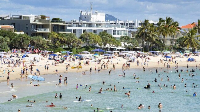 School holiday crowds pack into Noosa Main Beach. Picture: Lachie Millard