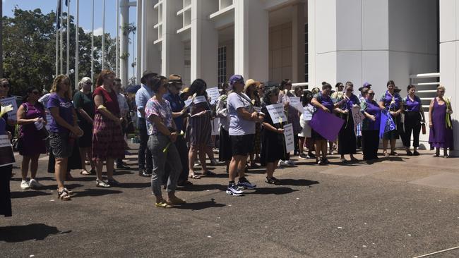 Darwin residents joined a Territory-wide day of action on Tuesday calling for action to address the NT's chronic domestic violence rates.