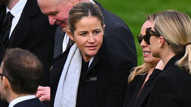 Melbourne Cup-winning jockey Michelle Payne was at the funeral.