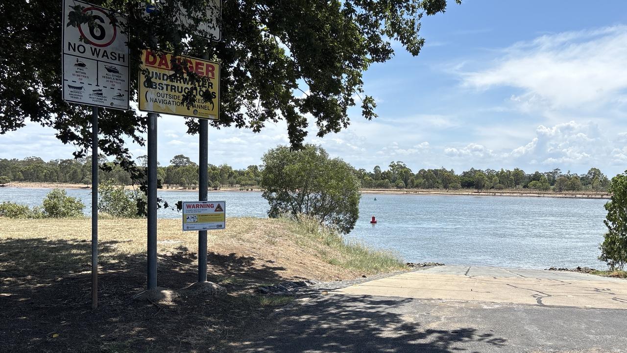 Warning signs were put up at the McGills Road boat ramp aft a possible crocodile sighting on Friday. Picture: DETSI