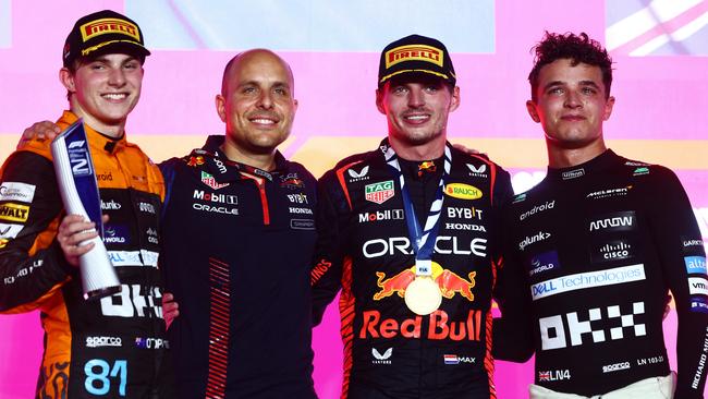 Oscar Piastri (left) with Red Bull Racing race engineer Gianpiero Lambiase, race winner Max Verstappen and third-placed Lando Norris on the podium after the Qatar Grand Prix. Picture: Getty Images