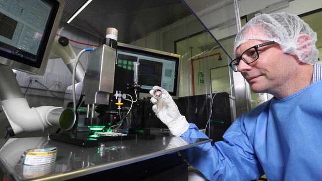 Angus Forster, Vaxxas chief development and operations officer, in a lab at the Translational Research Institute . Pic Annette Dew