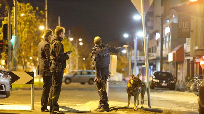 Officers at the Fitzroy North scene. Picture: Patrick Herve