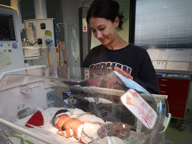 Mum Ashley Smith watches over her daughter Remi at the Joan Kirner Women’s and Children’s Hospital NICU in Sunshine. Picture: David Caird