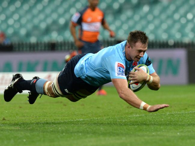 Waratahs' Jed Holloway scores a try against Canterbury Crusaders at the SCG. Picture: Jeremy Piper
