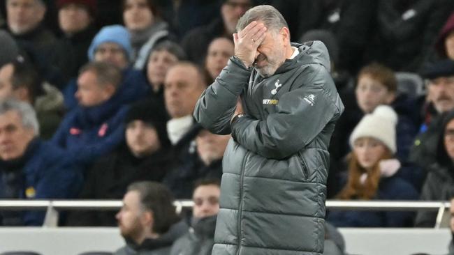 Ange Postecoglou was doing a lot of this as his side got thrashed. (Photo by Glyn KIRK / AFP)