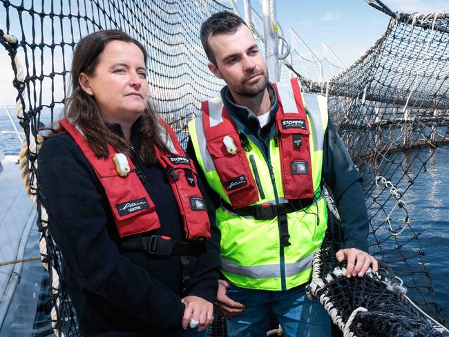 Depha Miedecke, General Manager technical strategy and Tom Mountney assistant farm manager for Petuna aquaculture at the companies Salmon farming lease in Macquarie Harbour on the west coast of Tasmania.For story about the the Salmon farming and the endangered Maugean skate.08/05/2024photo - Peter Mathew