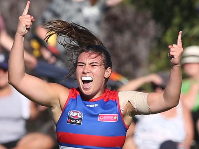 Bonnie Toogood for the Bulldogs celebrates after scoring a goal for the Bulldogs during the AFLW Round 1 match between Western Bulldogs and Fremantle Dockers at Victoria University Whitten Oval in Melbourne, Sunday, February 4, 2018. (AAP Image/David Crosling) NO ARCHIVING, EDITORIAL USE ONLY