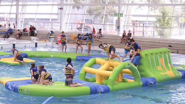 Inflatable school holiday fun at Casey ARC.