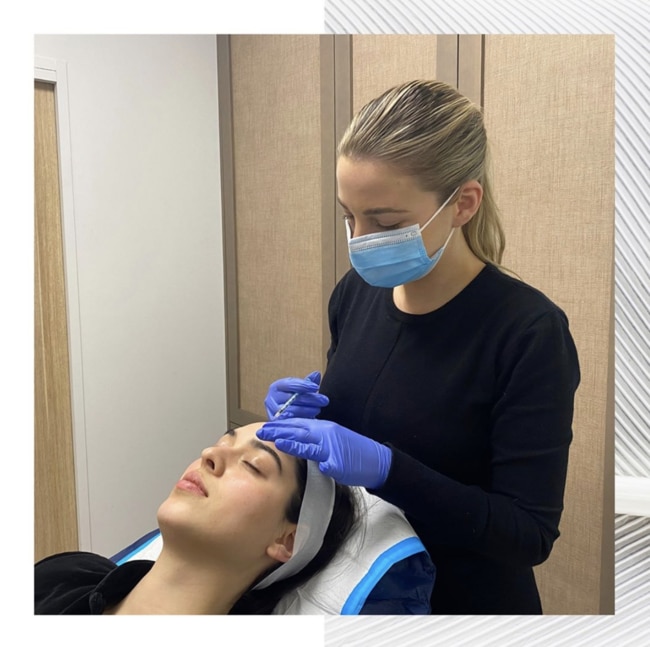 A client receiving an injectable clinic at Artisan Clinics.