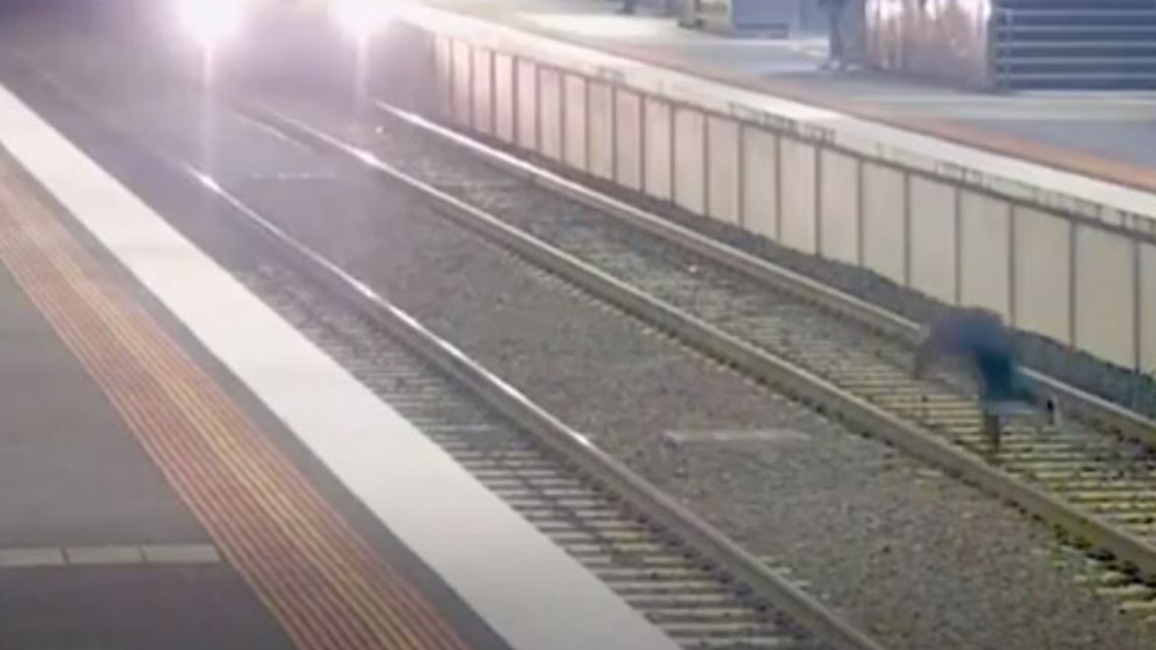 The train driver engaged the train's emergency brake as the man scrambled to get to his feet. Picture: Metro