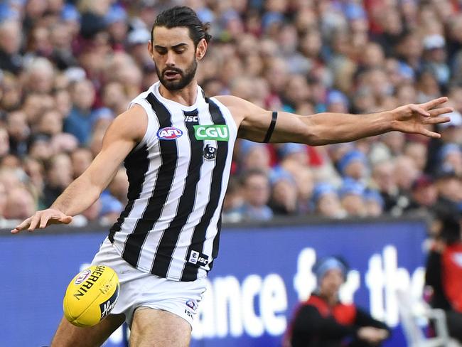 Brodie Grundy of the Magpies is seen in action during the Round 12 AFL match between the Melbourne Demons and the Collingwood Magpies at the MCG in Melbourne, Monday, June 11, 2018. (AAP Image/Julian Smith) NO ARCHIVING, EDITORIAL USE ONLY