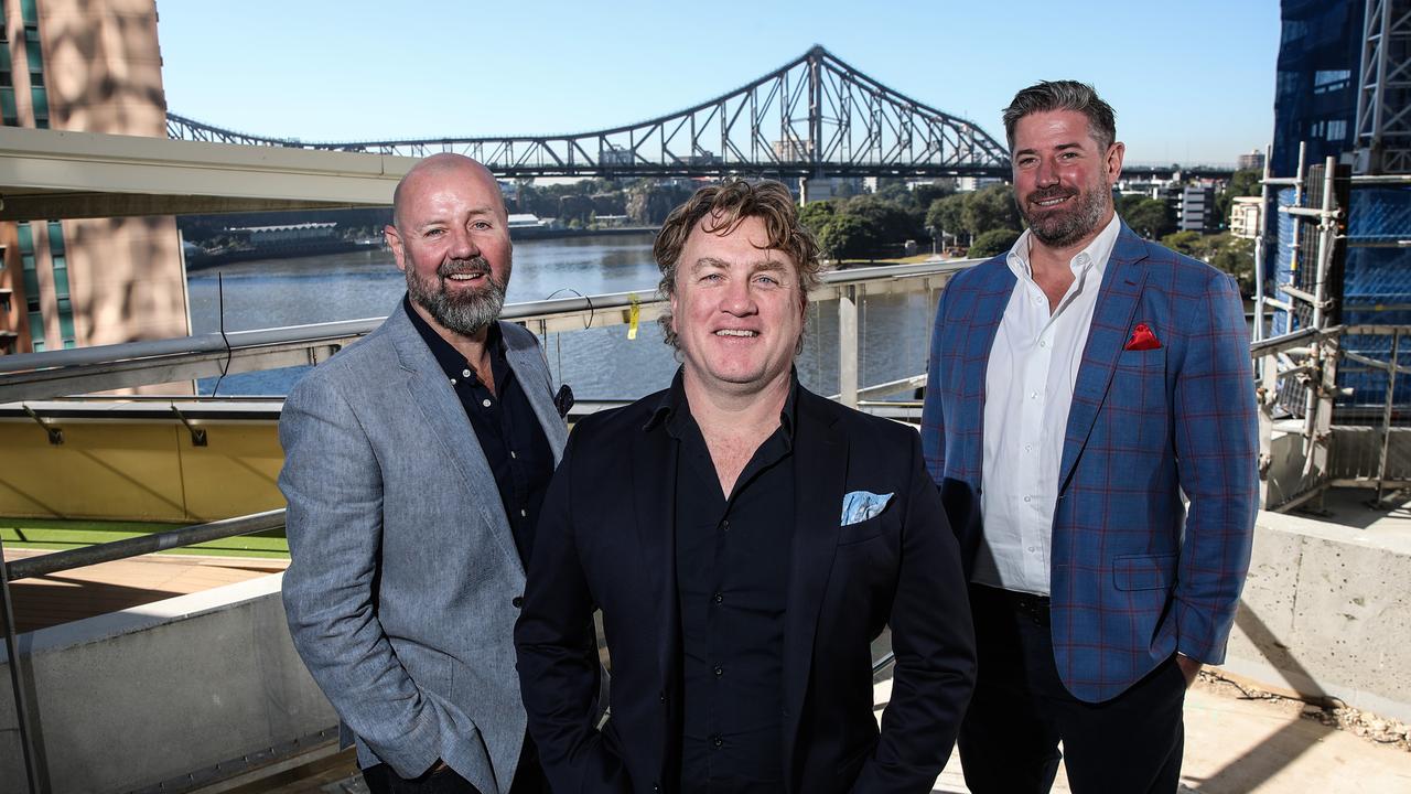 Chris Higgins, Adrian Richardson and Liam McMahon show off the view from their new restaurant site along Queen St in Brisbane City. Picture: Zak Simmonds