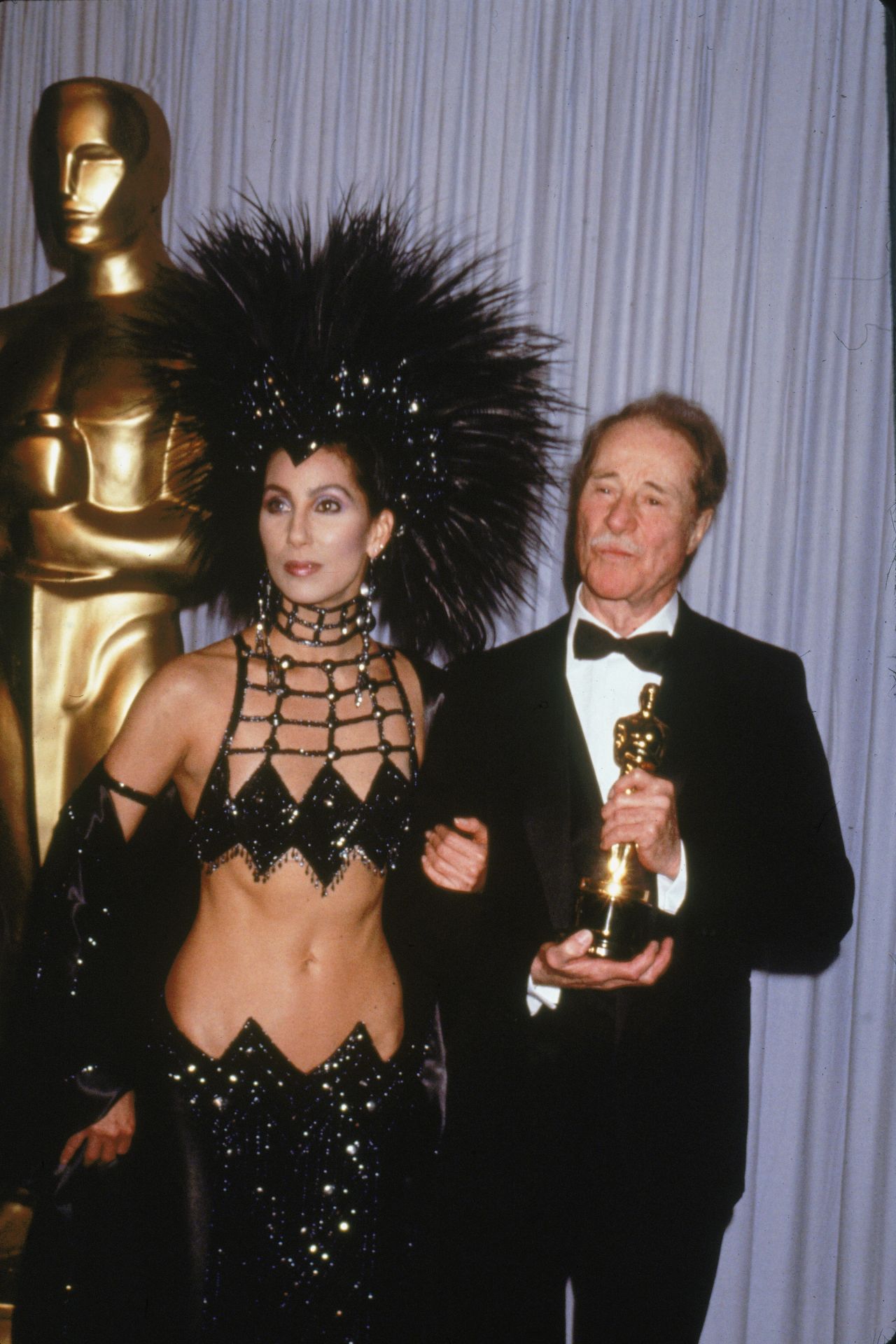 <p><b>Cher in Bob Mackie (1986)</b></p><p>Of all the Oscars attendees who&rsquo;ve made waves with fashion, Cher comes out on top. But it wasn&rsquo;t always that way; when the multi-hyphenate performer began to receive acclaim for her acting work in the 1980s, she says the Academy initially didn&rsquo;t take her seriously, and fashion became her form of rebellion.&nbsp;</p><p>&ldquo;[They] didn&rsquo;t really like me&hellip; they hated the way I dressed, I had young boyfriends, and they just thought I wasn&rsquo;t serious,&rdquo; the superstar recalled in a 2019 <a href="https://www.youtube.com/watch?v=ElSJb6CmS3c" target="_blank" rel="nofollow noopener">interview with <i>Vogue</i></a>. &ldquo;As you can see, I got my handbook on how to dress like a &lsquo;serious actress&rsquo;.&rdquo; Eventually, she was recognised as one; she won the Academy Award for Best Actress for her performance in <i>Moonstruck</i> two years later.&nbsp;</p>