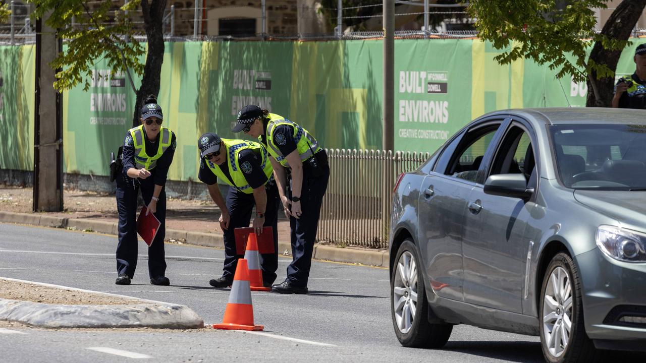 Police at the scene of Woodville Rd, Woodville South after a crash between a car and a pedestrian. Picture: NCA NewsWire / Kelly Barnes