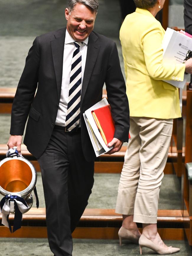 Richard Marles brings the AFL Premiership Cup 2022 to Question Time at Parliament House in Canberra in November. Picture: NCA NewsWire / Martin Ollman