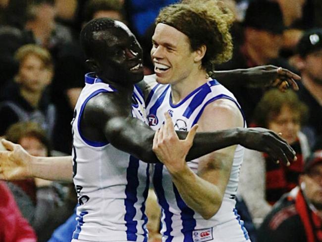 Majak Daw celebrates a goal with teammate Ben Brown. Picture: George Salpigtidis