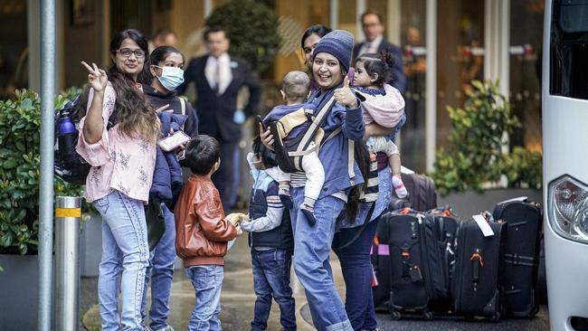 Some of the residents who left the Pullman Adelaide hotel after spending two weeks in mandatory quaratnine. Picture: Mike Burton