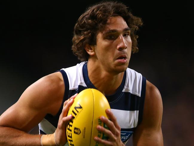 PERTH, AUSTRALIA - MARCH 26: Nakia Cockatoo of the Cats looks to pass the ball during the round one AFL match between the Fremantle Dockers and the Geelong Cats at Domain Stadium on March 26, 2017 in Perth, Australia.  (Photo by Paul Kane/Getty Images)