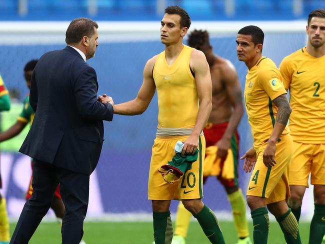 SAINT PETERSBURG, RUSSIA - JUNE 22: Ange Postecoglou manager of Australia shakes hands with Trent Sainsbury of Australia after the FIFA Confederations Cup Russia 2017 Group B match between Cameroon and Australia at Saint Petersburg Stadium on June 22, 2017 in Saint Petersburg, Russia.  (Photo by Dean Mouhtaropoulos/Getty Images)