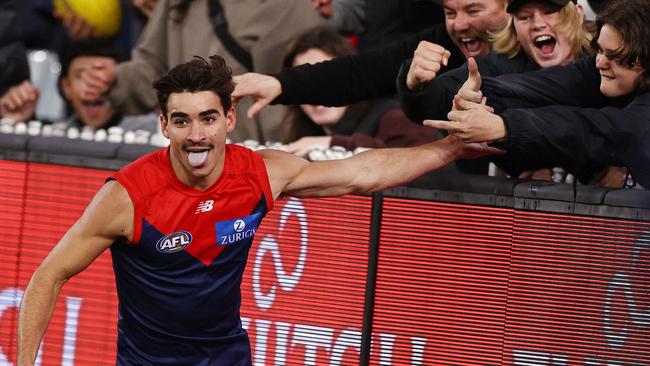 Toby Bedford celebrates a goal with fans on Friday night. Picture: Michael Klein