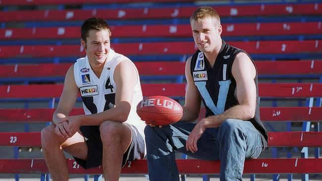 AFL National Under-18 championships. Captain of the Vic Metro team Chris Judd (right) and captain of the Vic Country James Ba...