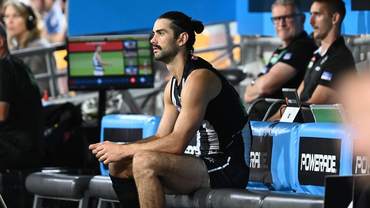 Brodie Grundy watches on from the bench as the Magpies lost to the Geelong Cats. Picture: Quinn Rooney