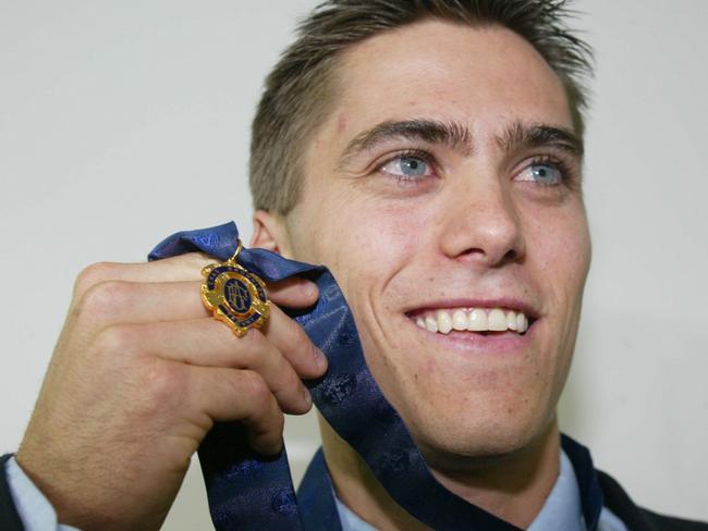 Simon Black celebrates his Brownlow Medal win. Picture: Colleen Petch