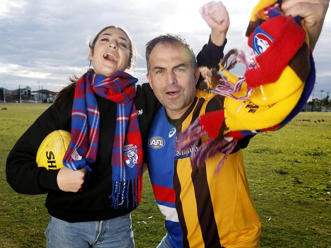 NCA. MELBOURNE, AUSTRALIA. September 4 , 2024. AFL . Ex Bulldog and Hawks footballer Brian Lake is torn between his 2 former teams before Friday nights elimination final. Brian with his daughter Mylee    . Pic: Michael Klein