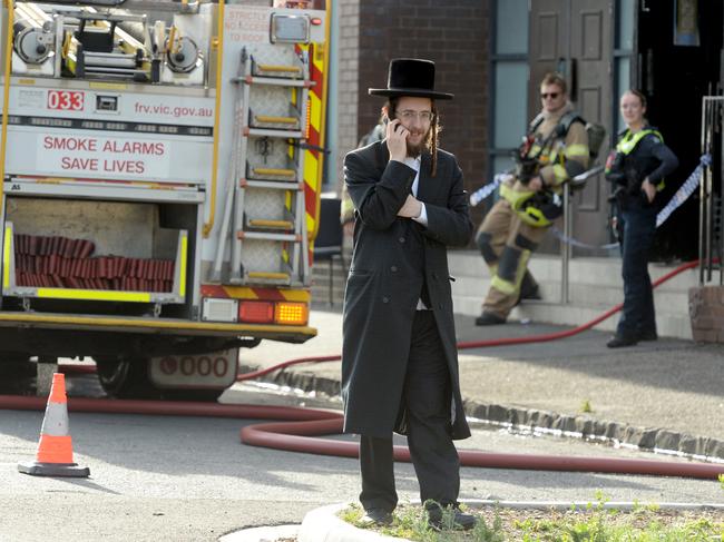 MELBOURNE, AUSTRALIA. NewsWire Photos. 6 DECEMBER, 2024.  Police and fire crews mop up after a fire at a synagogue at East St Kilda. The Adass Israel Synagogue, an ultra orthodox synagogue in Ripponlea, was attacked about 4am on Friday December 6, Picture: NewsWire/ Andrew Henshaw