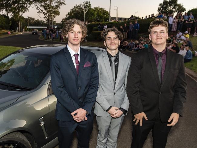 Arriving at Harristown State High School formal are (from left) Tristan Swartz, Ryley Busiko and Brock O’Dempsey at Highfields Cultural Centre, Friday, November 18, 2022. Picture: Kevin Farmer