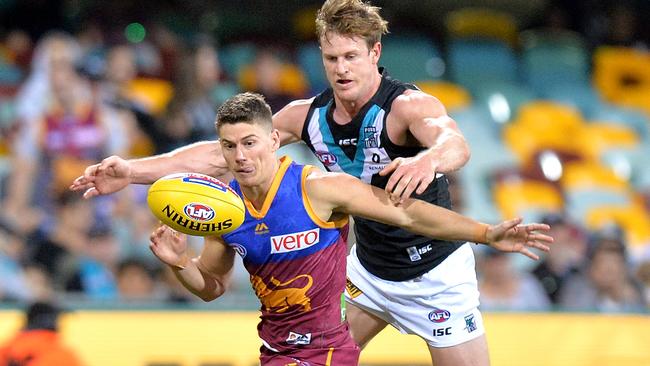 The pressure is put on Dayne Zorko. Picture: Getty Images