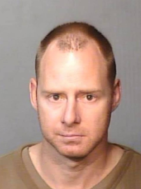 James Tozer, 35, who is described as 172cm, caucasian, fair skin and ginger hair wearing prison greens. Picture: NSW Police