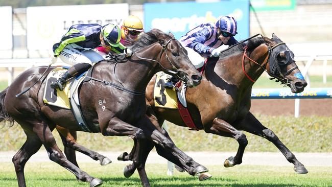 Modown (outside) finishes over the top of Oh Too Good to win the VOBIS Gold Bullion at Pakenham on Saturday. Picture: Scott Barbour/Racing Photos via Getty Images