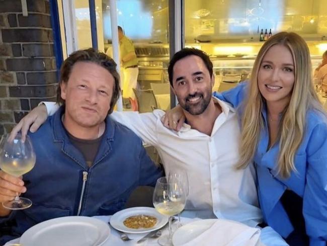 Jamie Oliver, Andy Allen and his wife Alex at The River Cafe in London. Picture: Supplied/Instagram