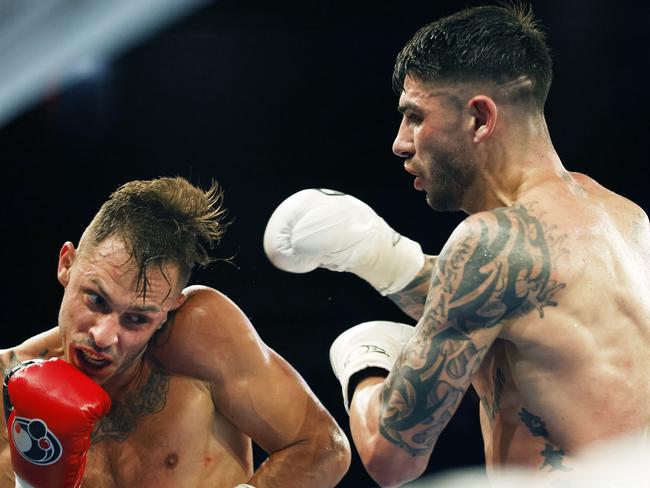 Tszyu had some choice words for long time rival Michael Zerafa (R). Picture: Getty Images.