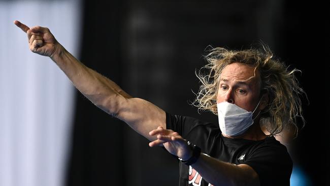 Ariarne Titmus' coach Dean Boxall was back at it again with his animated celebrations, riding her home to the finish. Picture: Getty Images.