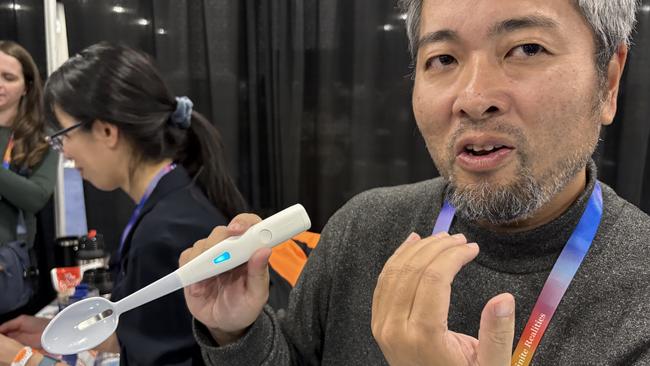 Kirin’s Kiyohiro Izumo with the Kirin Electric Salt spoon at CES 2025. Picture: Benedict Brook