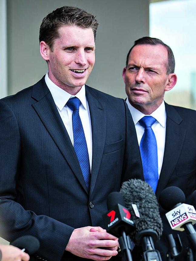 Tony Abbott looks on as Andrew Hastie addresses the media in 2017. Picture: Matthew Poon