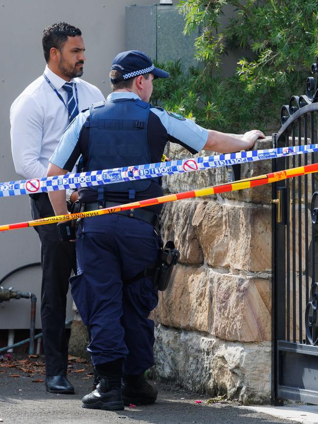 Police officers at the Hunters Hill home, which last sold for $8.5 million, on Monday. Picture: David Swift